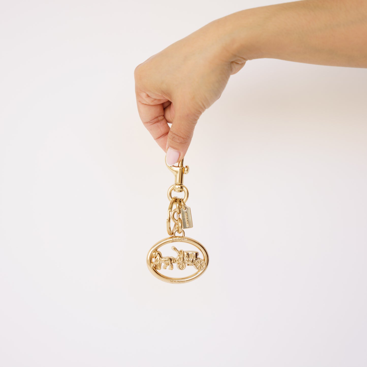 Coach Horse and Carriage Bag Charm in Gold Hardware 190326D24