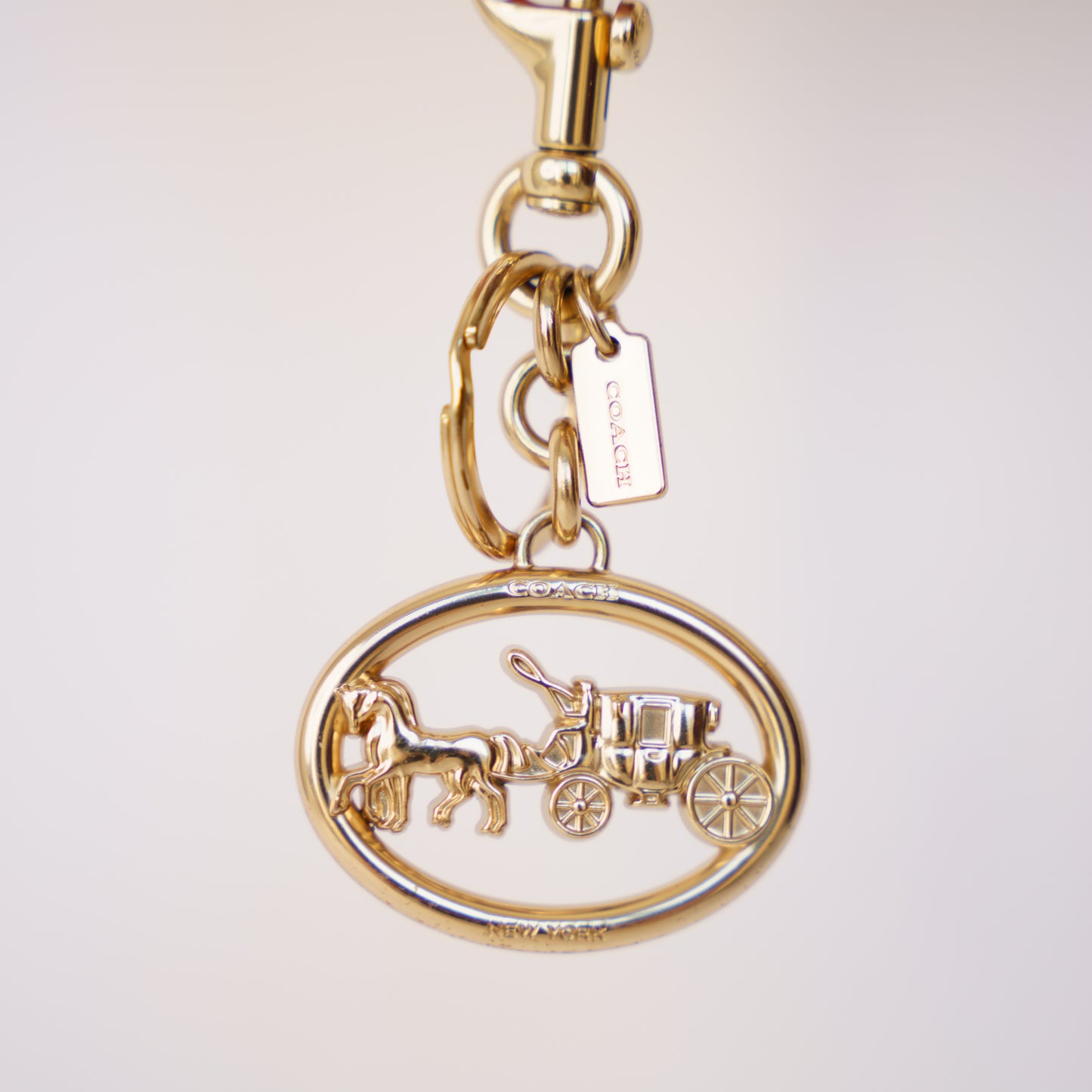 Coach Horse and Carriage Bag Charm in Gold Hardware 190326D24