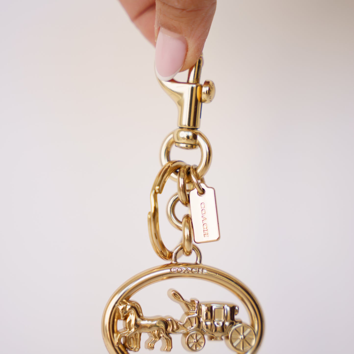 Coach Horse and Carriage Bag Charm in Gold Hardware 190326D24