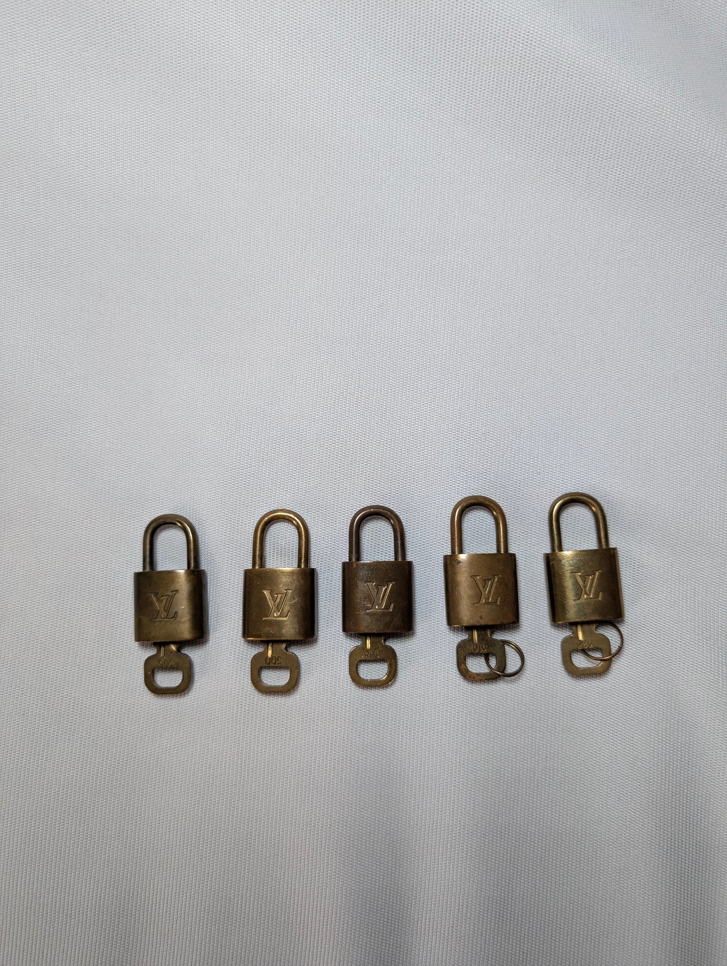 Authentic Louis Vuitton Padlock Random Number